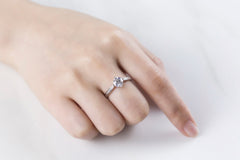 Glinting Solitaire Round Moissanite with Side Studded Shank Engagement Ring in Sterling Silver