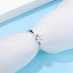 Tulip Style Round Solitaire Moissanite Twist By-pass Shank Embellished Prong Engagement Ring in Sterling Silver