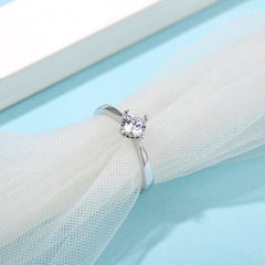 Elegant Round Four Prong  Moissanite Solitaire Engagement Ring in Sterling Silver
