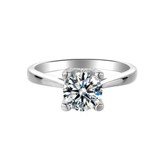 Sublime Solitaire Serenity Four Prong Set Round Moissanite Engagement Ring in Sterling Silver
