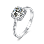 Contemporary Cushion Shape Symphony Round Moissanite Halo Engagement Ring in Sterlng Silver