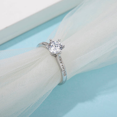 Vintage Style Elite Round Solitaire Moissanite Essence Engagement Ring in Sterling Silver with Side Studded shank
