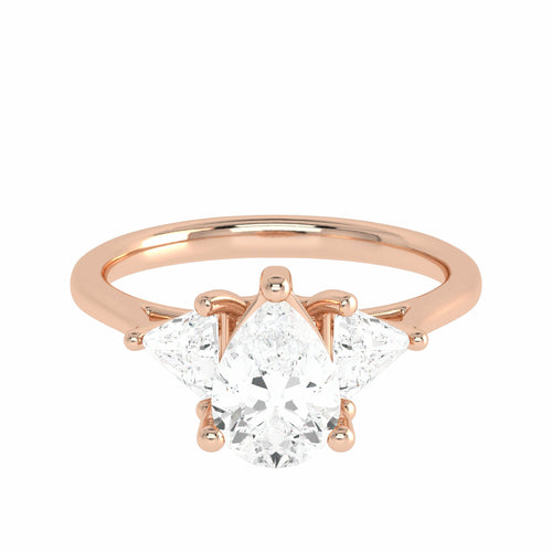 1 1/4 CT. Three Stone Pear and trapezoid Lab created Diamond Ring.