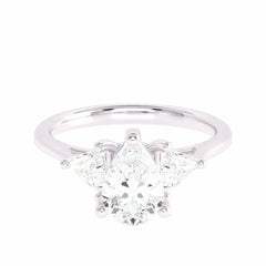 1 1/4 CT. Three Stone Pear and trapezoid Lab created Diamond Ring.