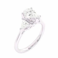 1 1/4 CT. Three Stone Pear and trapezoid Lab created Diamond Ring.