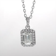 Enchanted Bliss Emerald Cut Moissanite Halo Style Pendant Necklace in Sterling Silver