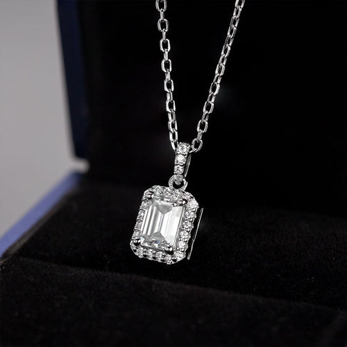 Enchanted Bliss Emerald Cut Moissanite Halo Style Pendant Necklace in Sterling Silver