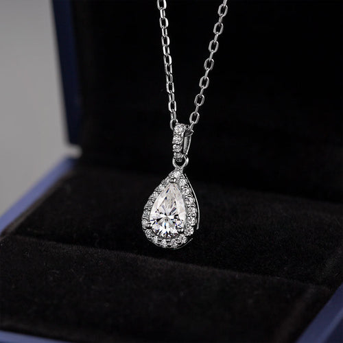 Whispers of Eternity Pear Shape Halo Style Moissanite Pendant Necklace in Sterling Silver