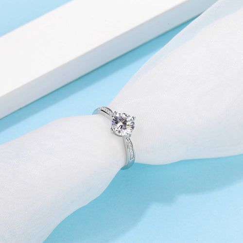 Glinting Solitaire Round Moissanite with Side Studded Shank Engagement Ring in Sterling Silver