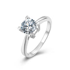 Sublime Solitaire Serenity Four Prong Set Round Moissanite Engagement Ring in Sterling Silver