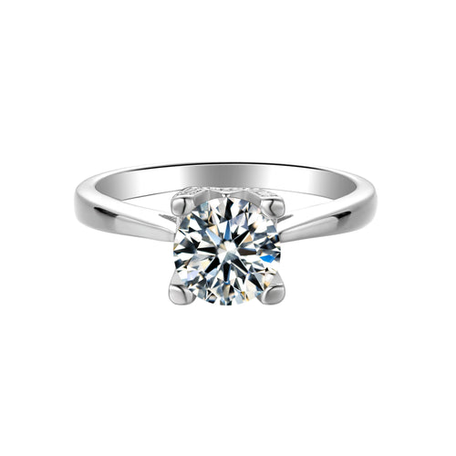 Sublime Solitaire Serenity Four Prong Set Round Moissanite Engagement Ring in Sterling Silver