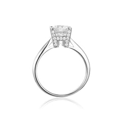 Sublime Solitaire Serenity Four Prong Set Round Moissanite Engagement Ring in Sterling Silver